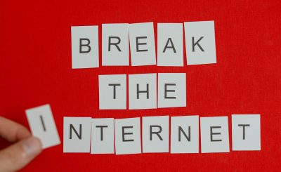 Cutout letters forming 'Break the Internet' on a vibrant red background. — Crypto casino vip transfer