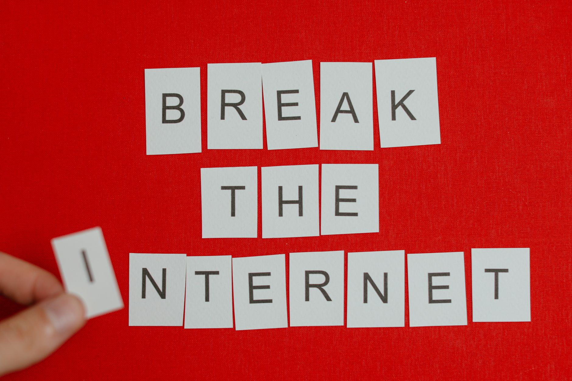 Cutout letters forming 'Break the Internet' on a vibrant red background. — Crypto casino vip transfer